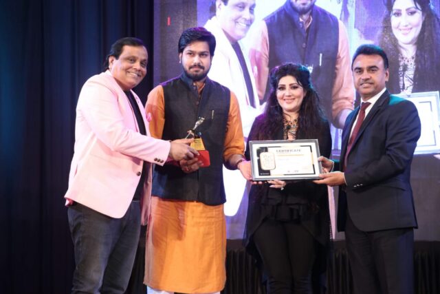 Rahul Raj receiving Award Top 50 Indian Icon Award for Social Service by Satrang & Dushyant's corporation Mumbai
